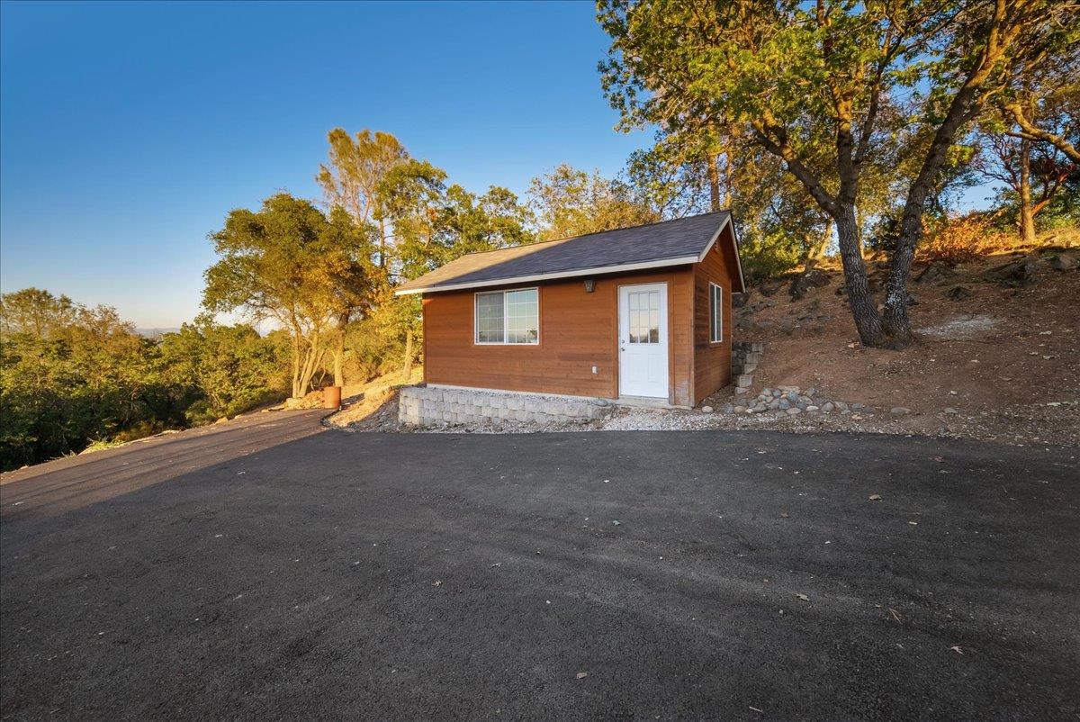 3565 Farview Court Rescue, CA 95672 - Photo 62 of 77 Lots of space to park cars in driveway and a turnabout area left of the shed.