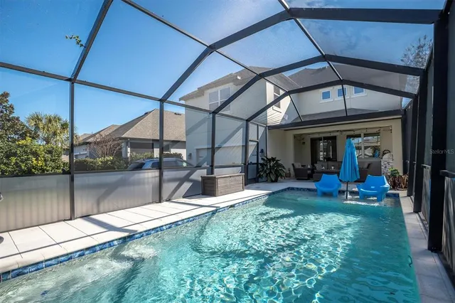 a view of a dining room with furniture window and outside view
