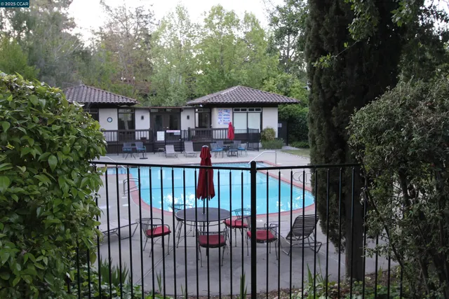 a view of a garden from a balcony