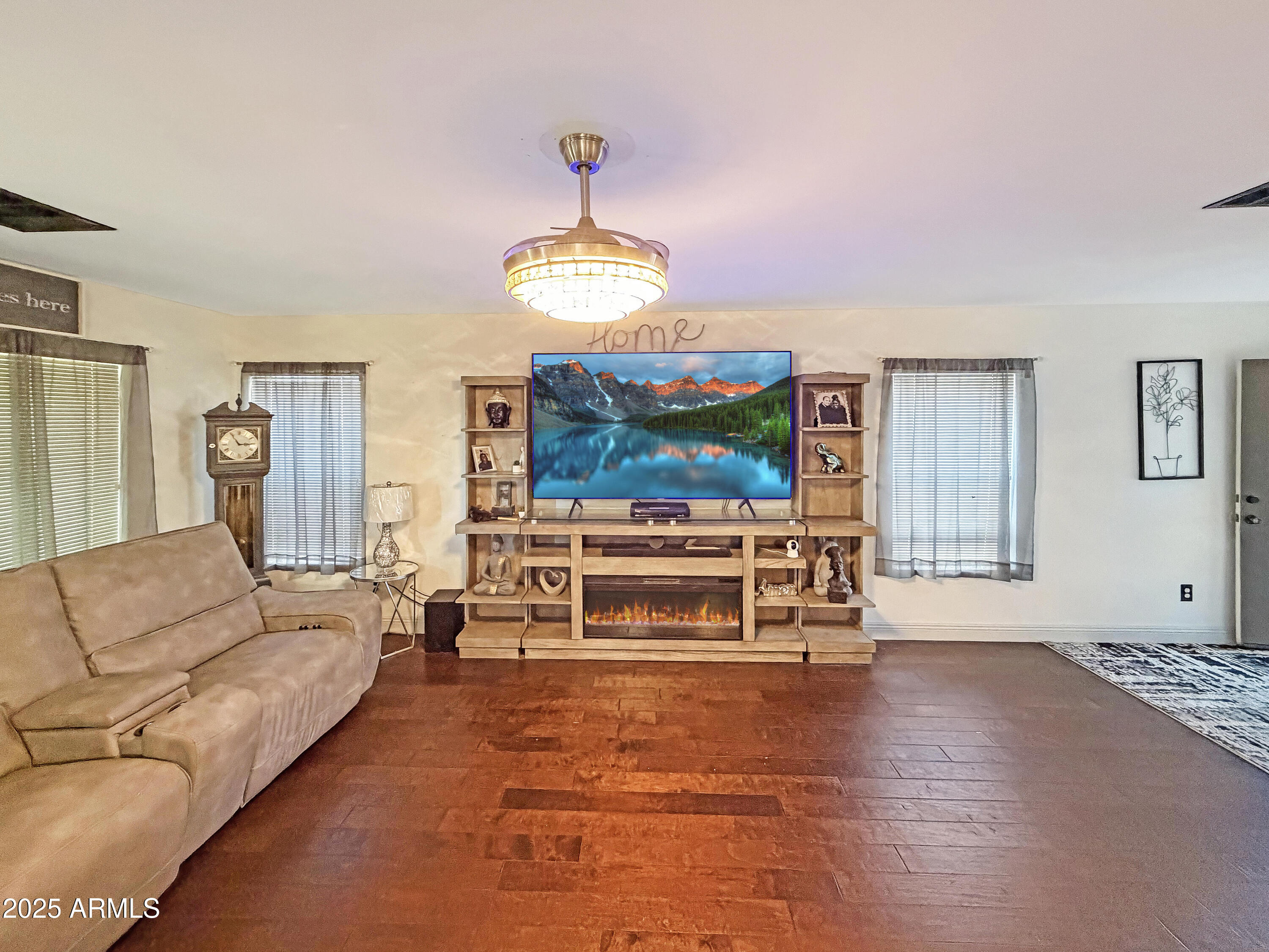 166 South 18 TH Street Coolidge, AZ 85128 - Photo 12 of 31 a living room with furniture and a flat screen tv