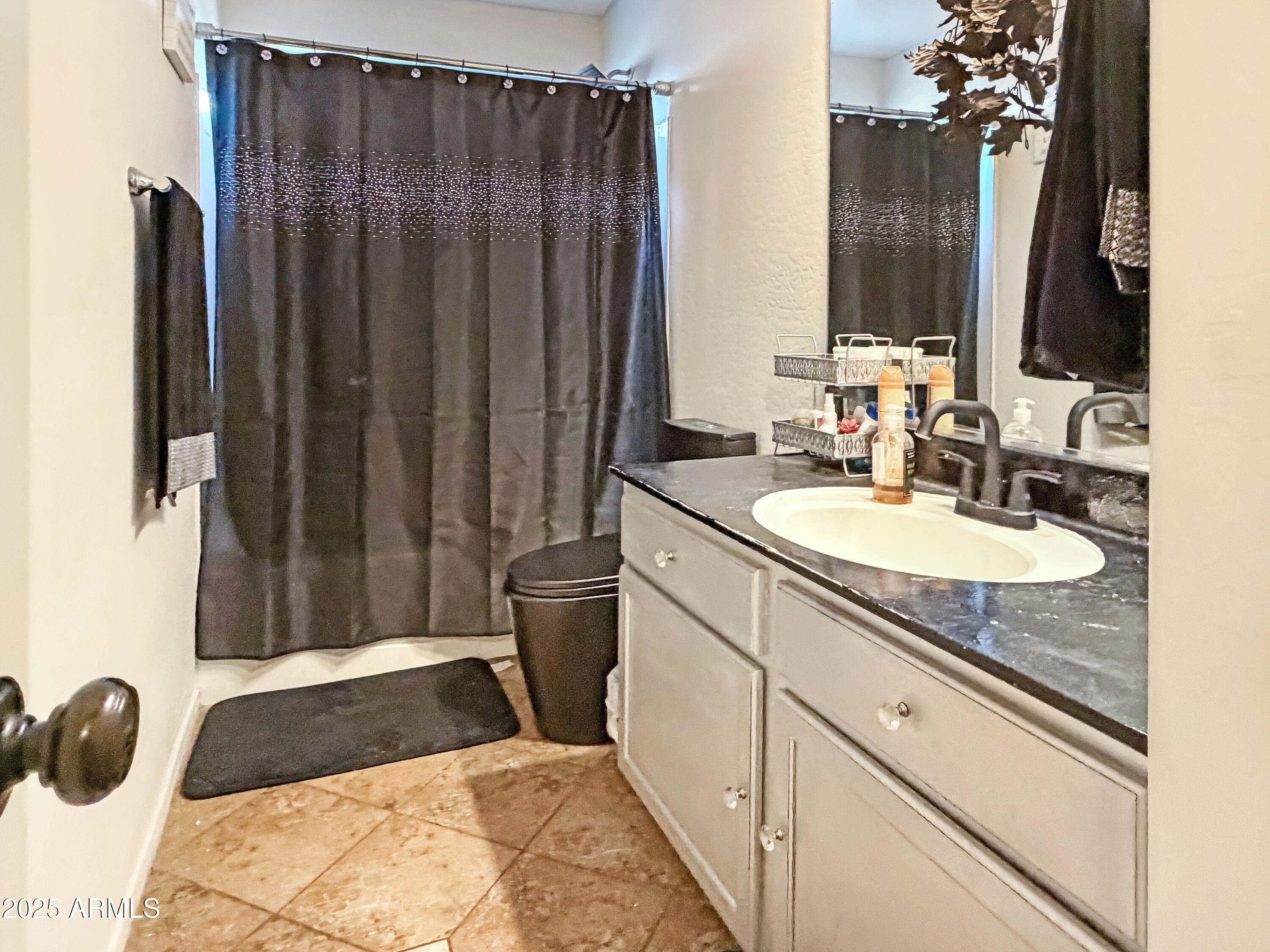 166 South 18 TH Street Coolidge, AZ 85128 - Photo 15 of 31 a bathroom with a granite countertop sink and a mirror