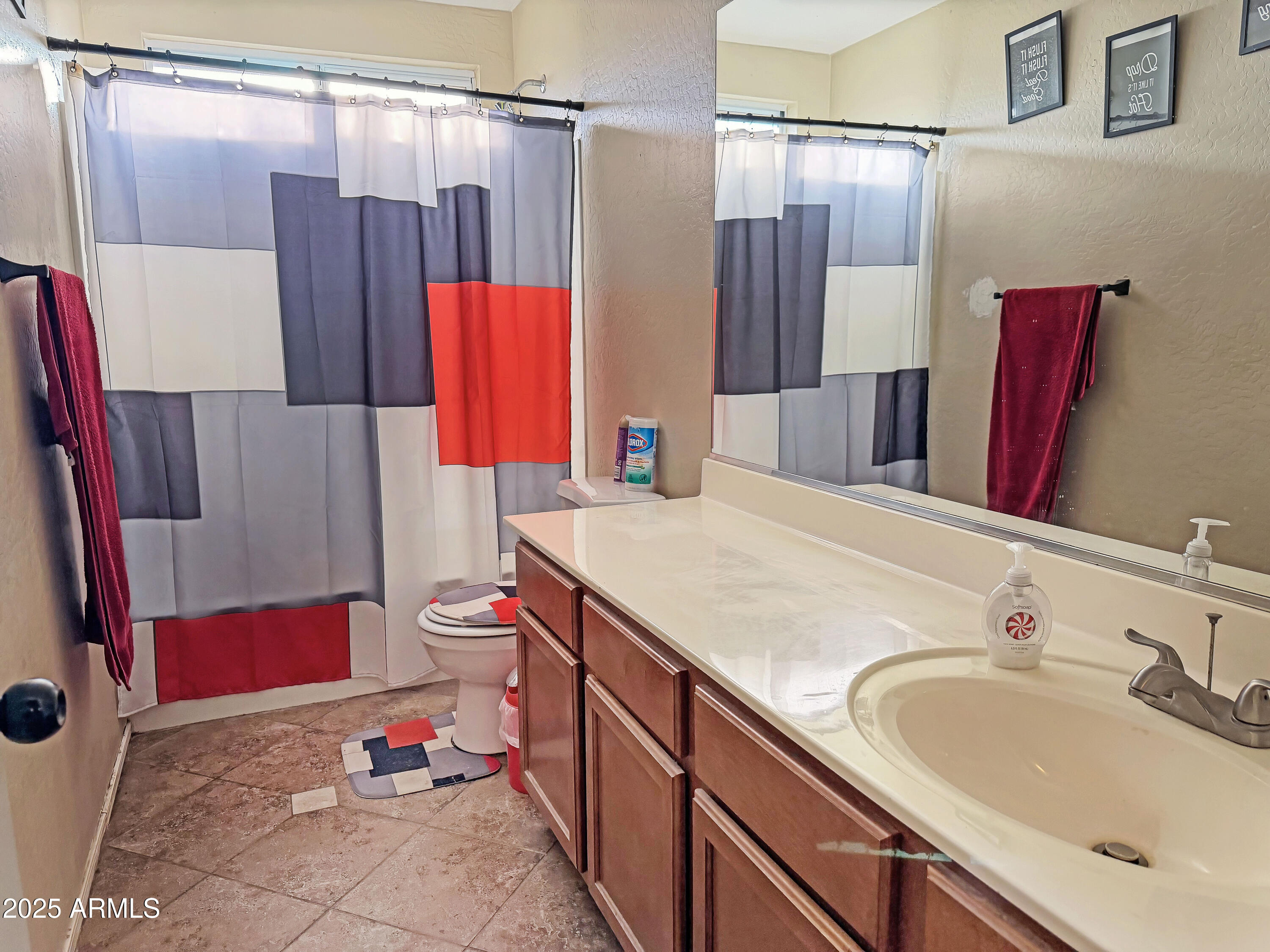 166 South 18 TH Street Coolidge, AZ 85128 - Photo 22 of 31 a bathroom with a sink and a mirror