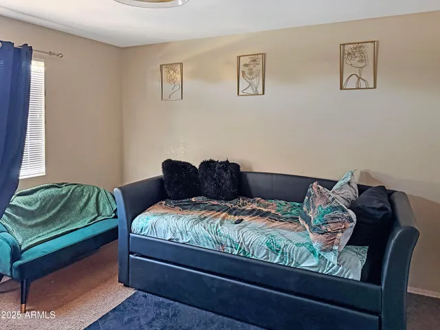 a view of an outdoor sitting area with swimming pool