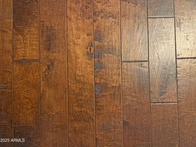 a view of a house with a swimming pool and a yard