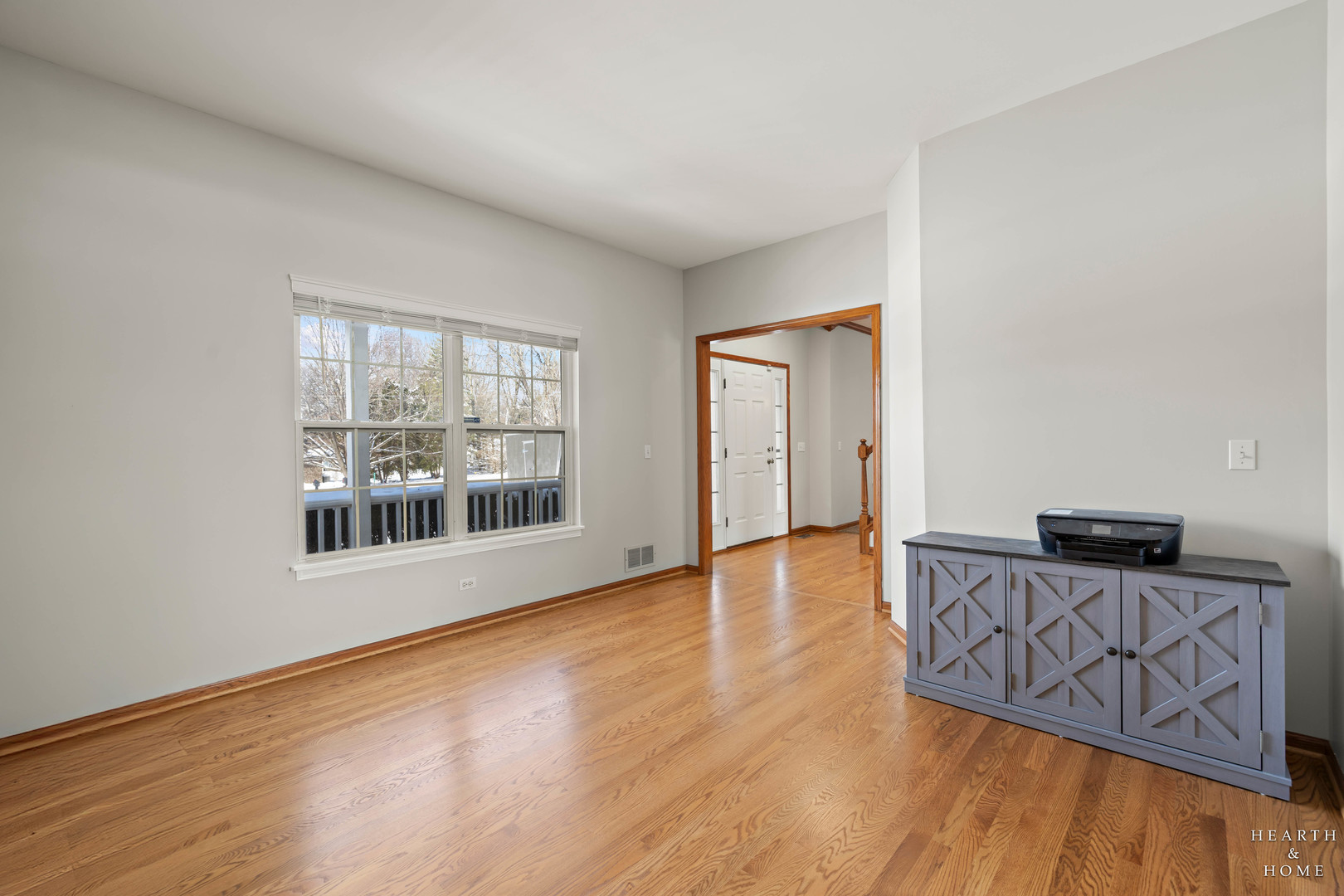10514 Ridge Lane Marengo, IL 60152 - Photo 17 of 51 a view of an empty room with wooden floor and a window