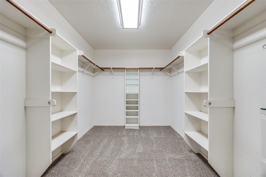1026 County Road 544 Nevada, TX 75173 - Photo 16 of 32 a view of walk in closet with empty racks