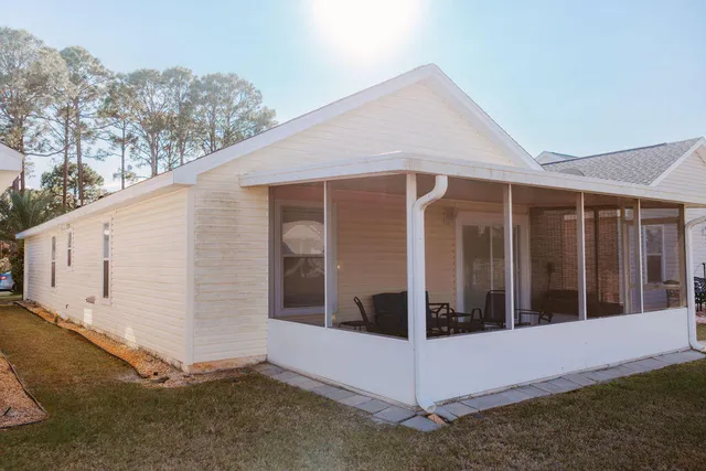 a view of a house with a large window