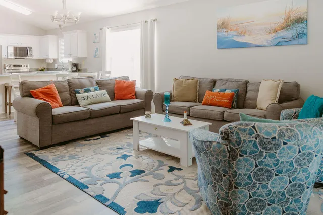 a living room with furniture and a couch