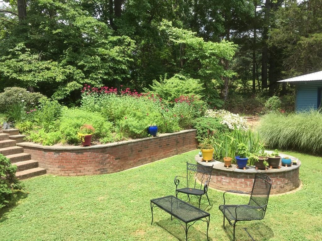 3301 West Cornwallis Road Durham, NC 27705 - Photo 68 of 72 Garden in full bloom from previous year.