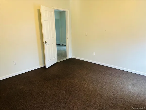 an empty room with a door