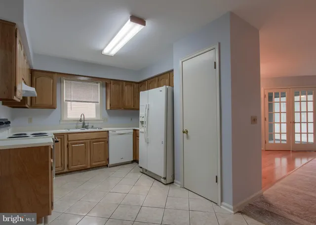 a view of a hallway view with staircase