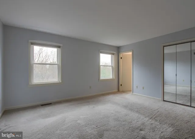 a view of a storage & utility room with a sink