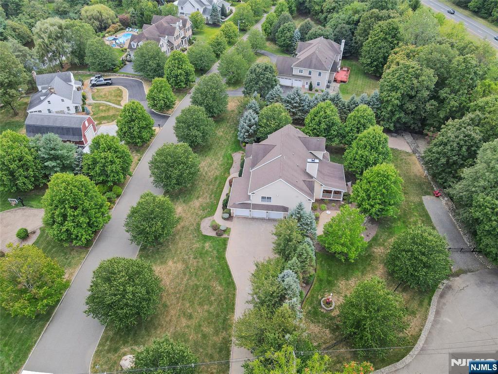 22 Meadowlake Drive Mahwah, NJ 07430 - Photo 39 of 39 an aerial view of a house with a yard and garden