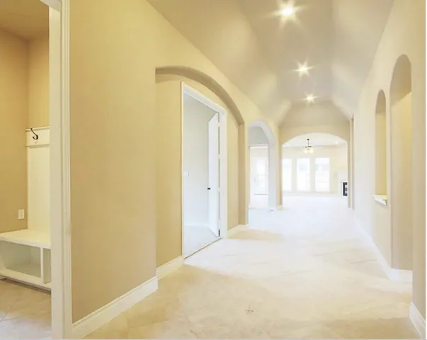 a view of a bathroom with shower and a sink