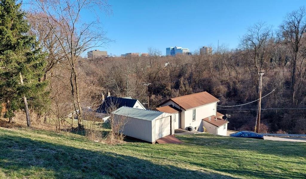 0 Oak Brook Circle Pittsburgh, PA 15220 - Photo 6 of 8 a view of a house with backyard and trees