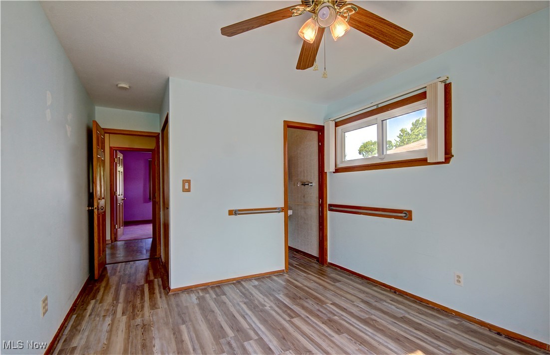 4757 Marigold Road Mentor, OH 44060 - Photo 16 of 27 Bedroom with ceiling fan and laminate floors