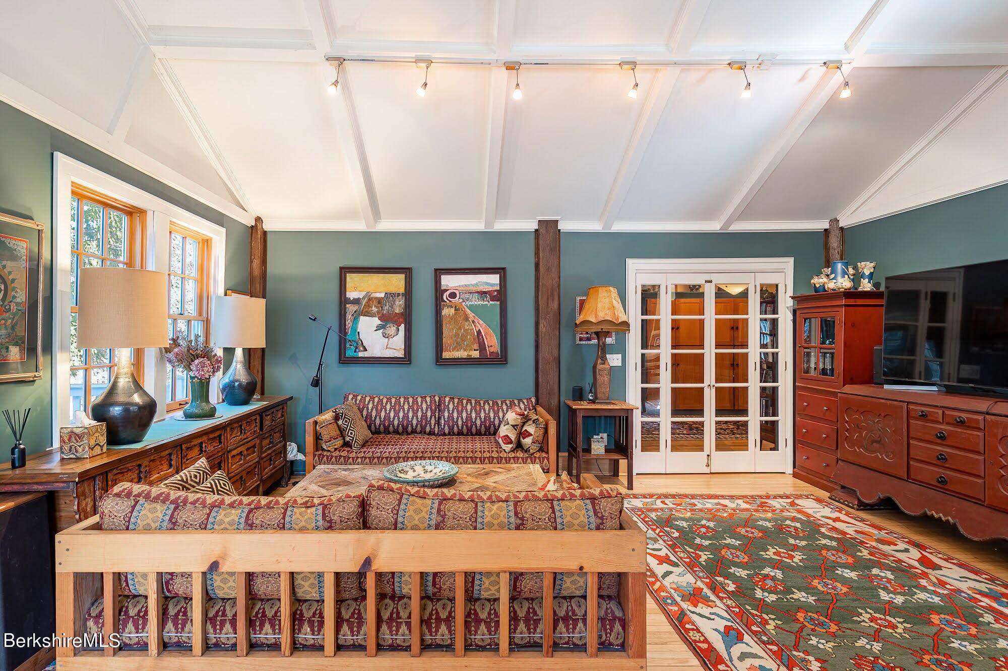 17 Cronk Road Monterey, MA 01245 - Photo 12 of 56 a bedroom with a bed and wooden floor