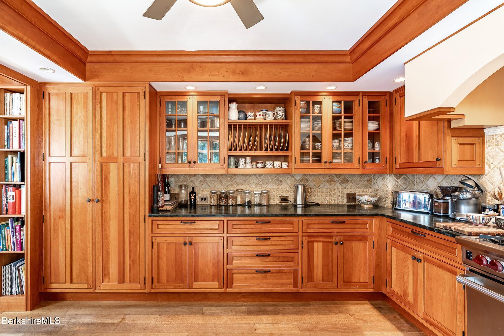 17 Cronk Road Monterey, MA 01245 - Photo 19 of 56 a kitchen with stainless steel appliances granite countertop a refrigerator and a stove top oven