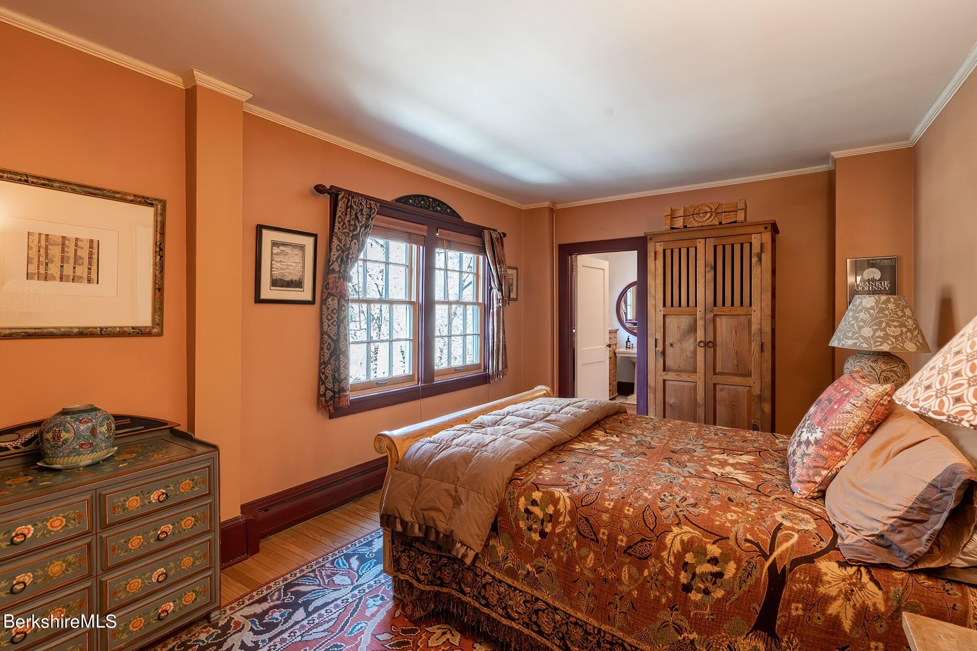 17 Cronk Road Monterey, MA 01245 - Photo 27 of 56 a bedroom with a bed closet and a window