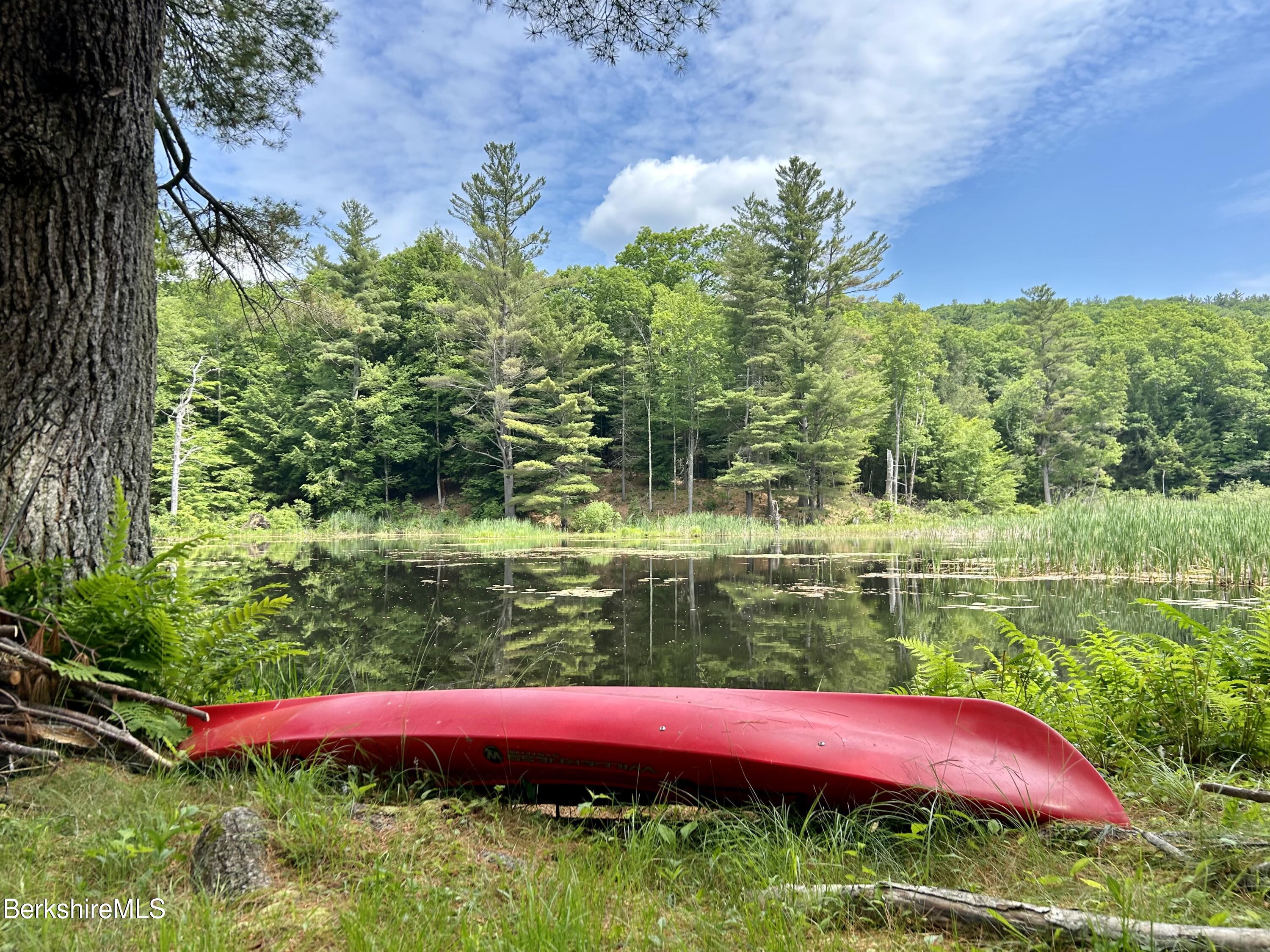 17 Cronk Road Monterey, MA 01245 - Photo 3 of 56 a view of a lake with a yard