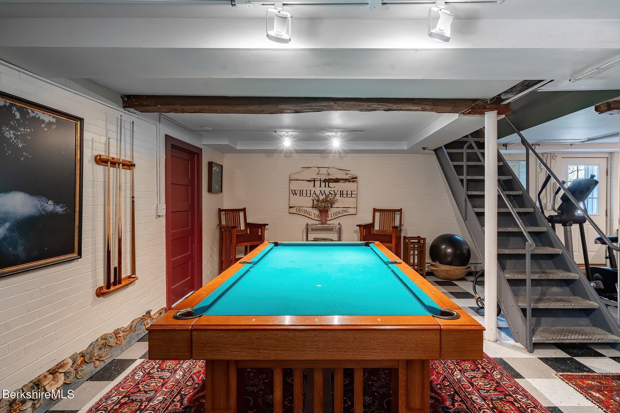 17 Cronk Road Monterey, MA 01245 - Photo 40 of 56 a room with pool table windows and a flat screen tv