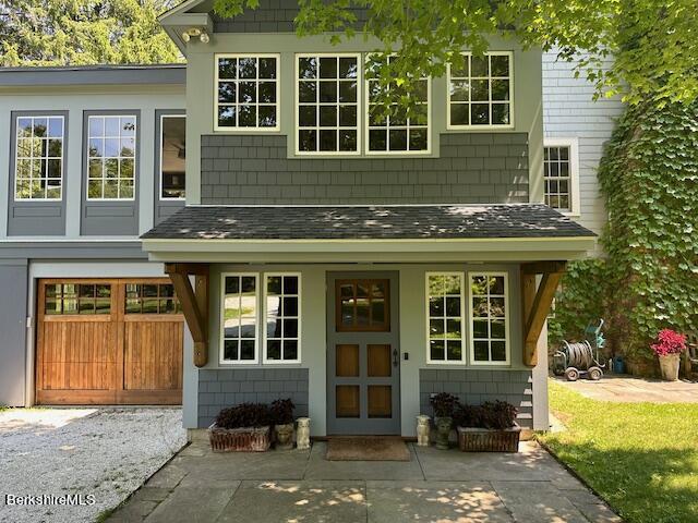 17 Cronk Road Monterey, MA 01245 - Photo 5 of 56 a front view of a house with a yard