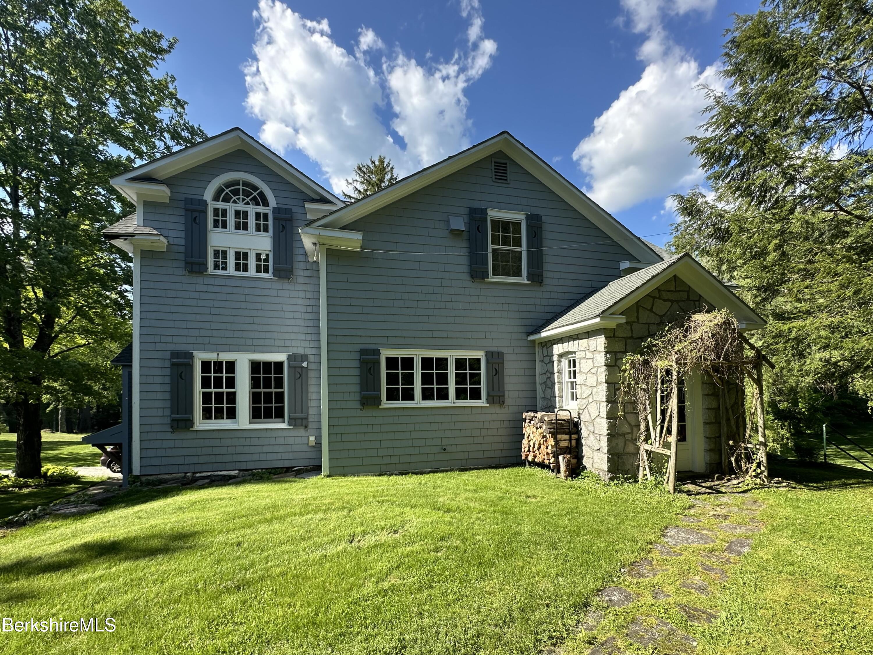 17 Cronk Road Monterey, MA 01245 - Photo 7 of 56 a view of a house with a yard