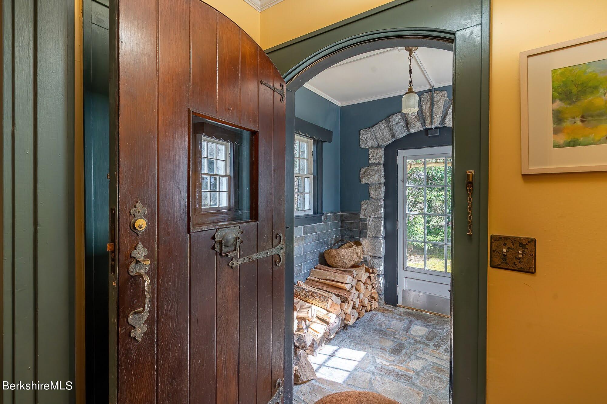 17 Cronk Road Monterey, MA 01245 - Photo 9 of 56 a view of an entryway with wooden floor and a livingroom