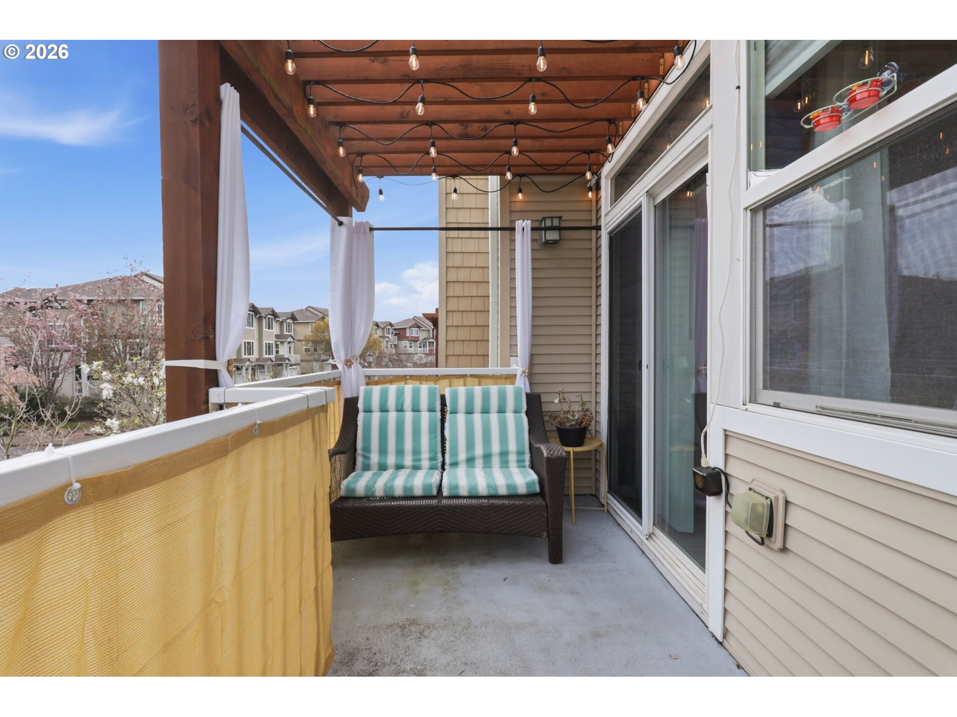 15095 Southwest Warbler Way, Unit 104 Beaverton, OR 97007 - Photo 35 of 46 a view of outdoor space with seating area