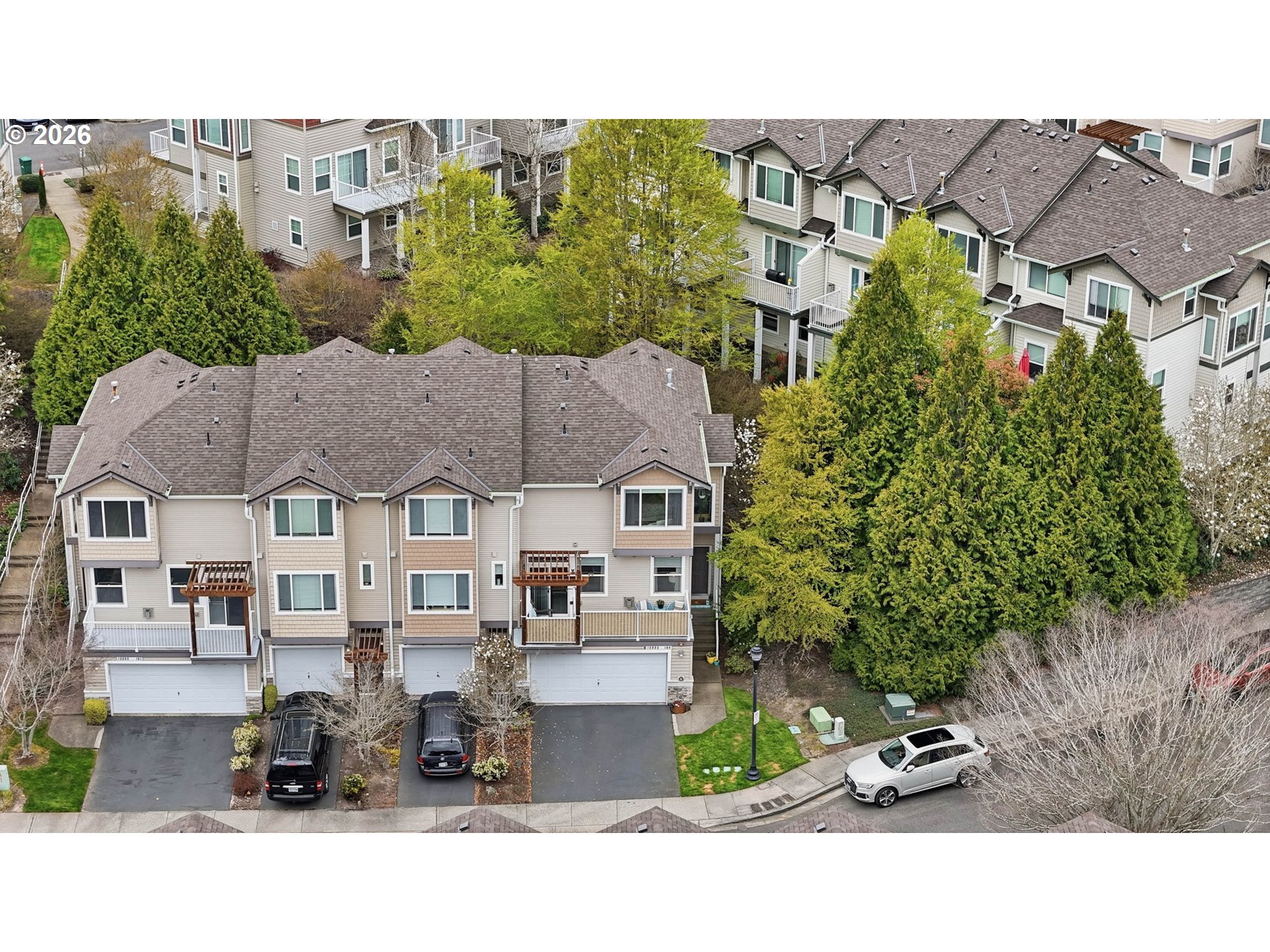 15095 Southwest Warbler Way, Unit 104 Beaverton, OR 97007 - Photo 39 of 46 an aerial view of multiple houses