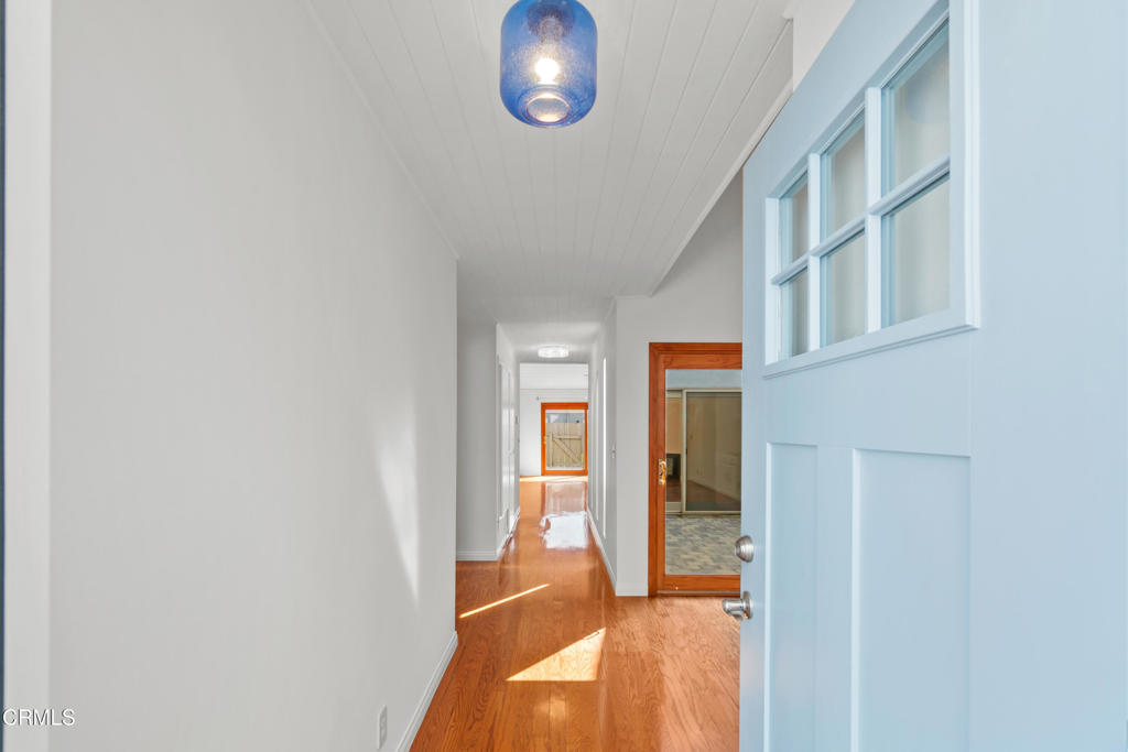 426 Reed Way Port Hueneme, CA 93041 - Photo 1 of 34 a view of a hallway view with wooden floor and staircase