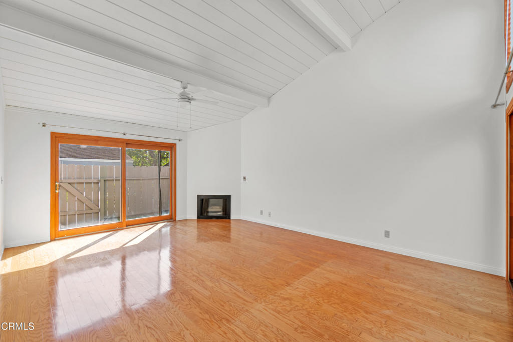 426 Reed Way Port Hueneme, CA 93041 - Photo 19 of 34 an empty room with wooden floor and windows