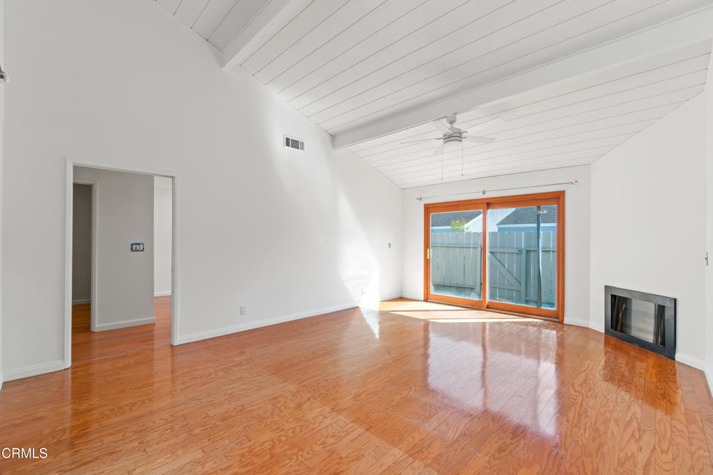 426 Reed Way Port Hueneme, CA 93041 - Photo 20 of 34 a view of an empty room with window and wooden floor