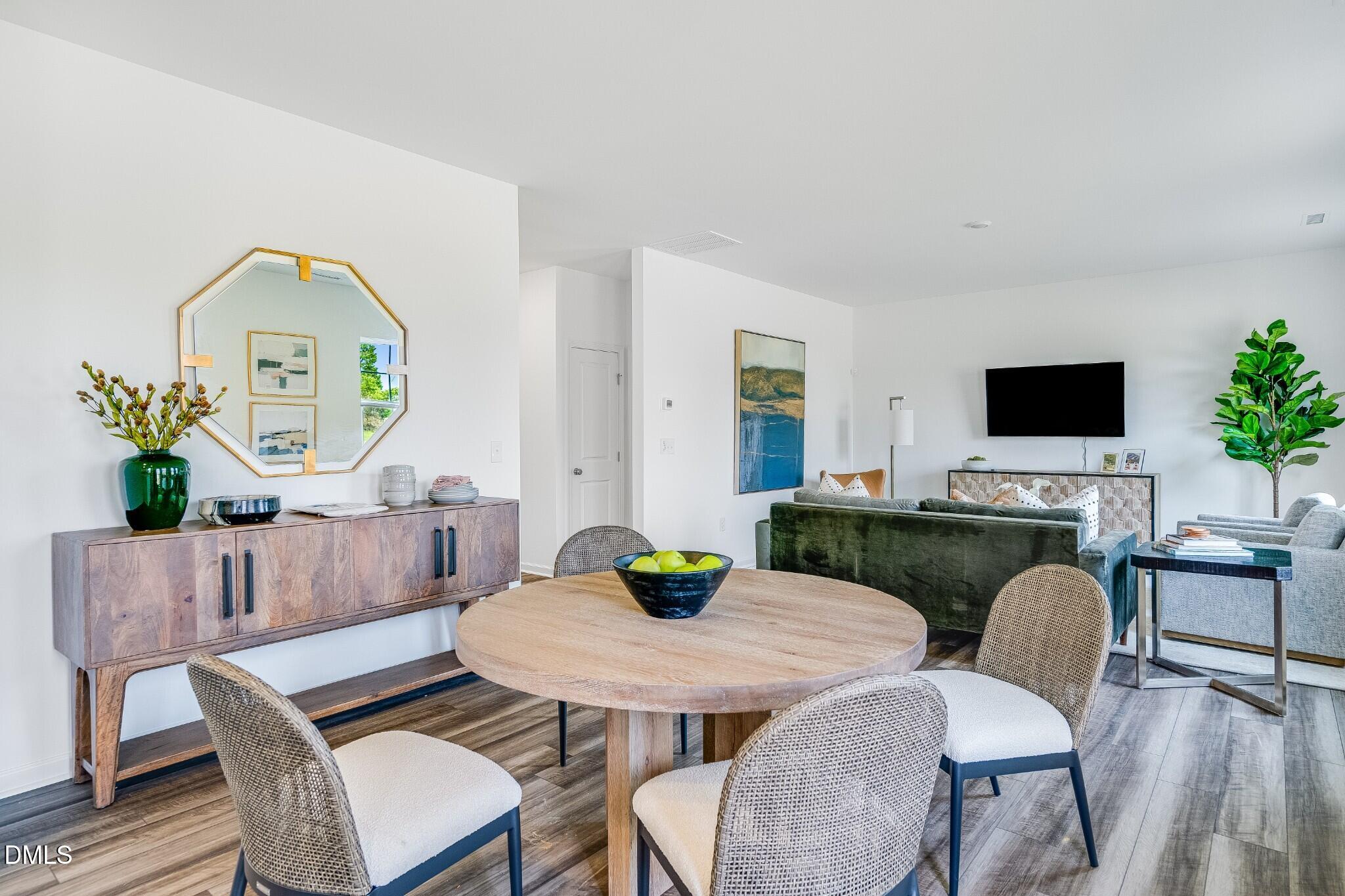 654 Roy Adams Road Angier, NC 27501 - Photo 13 of 38 a view of a dining room with furniture