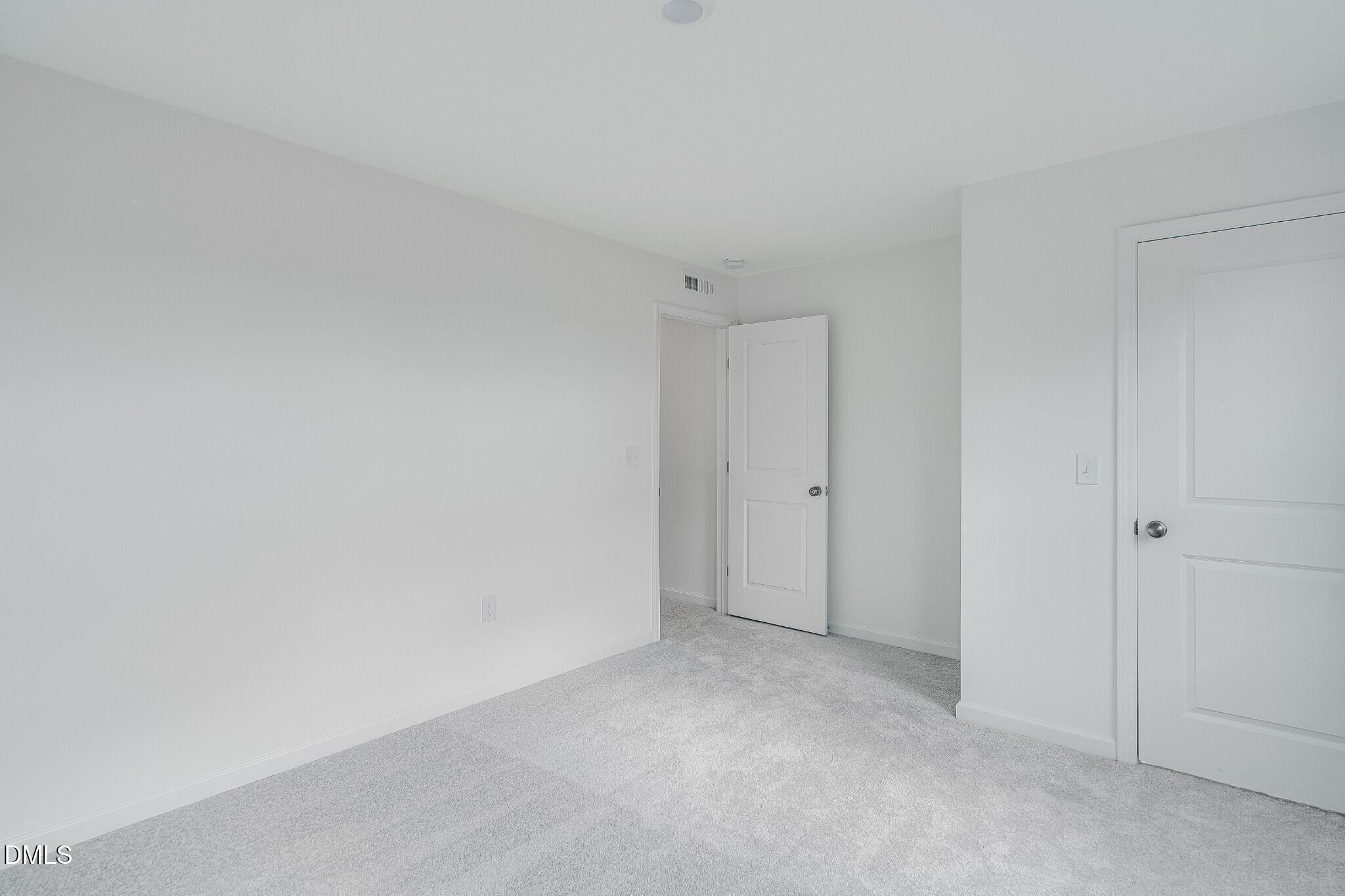 654 Roy Adams Road Angier, NC 27501 - Photo 25 of 38 a view of an empty room