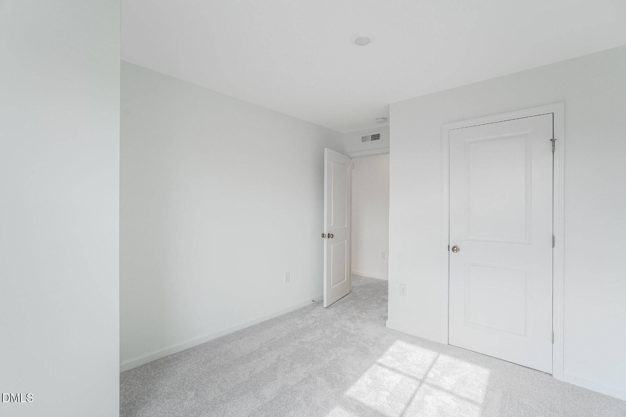 654 Roy Adams Road Angier, NC 27501 - Photo 27 of 38 a view of an empty room