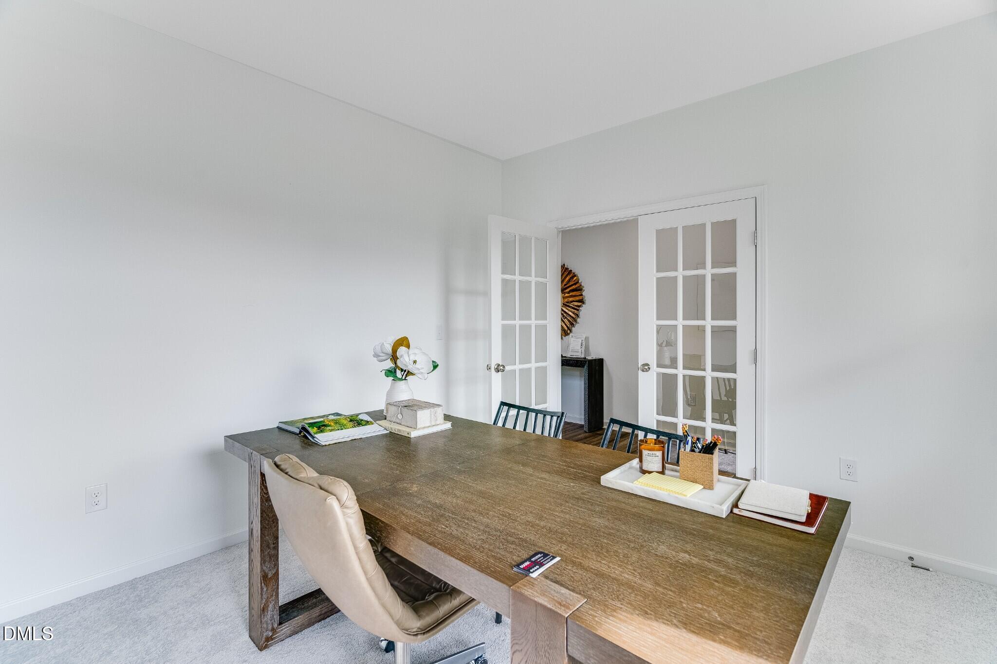 654 Roy Adams Road Angier, NC 27501 - Photo 7 of 38 a dining room with furniture and wooden floor