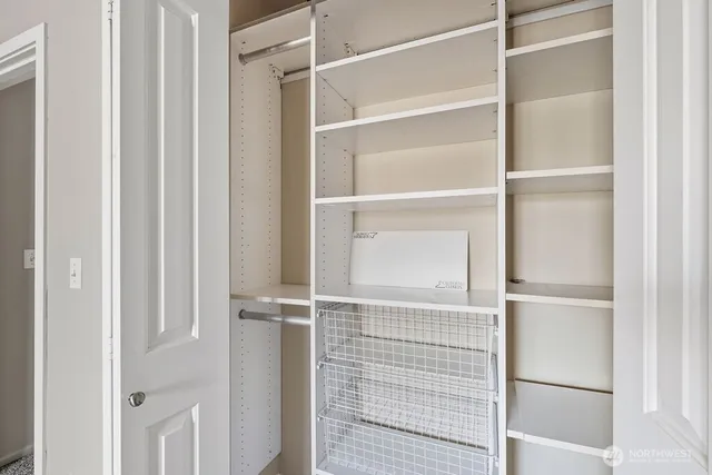 a view of an empty walk in closet