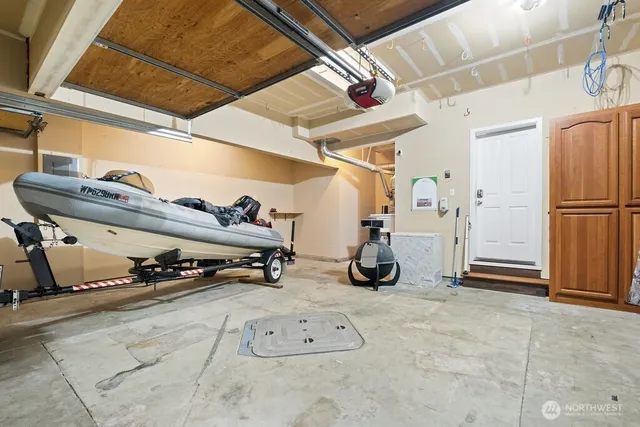 a view of backyard with a wooden fence
