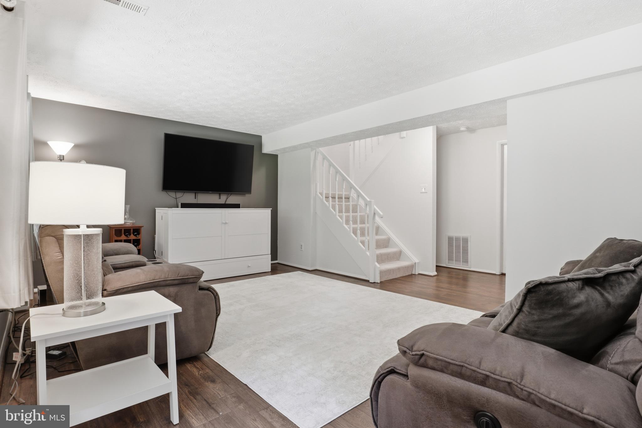 8033 Orange Plank Road Springfield, VA 22153 - Photo 13 of 26 Spacious lower level rec room