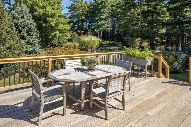 a view of a chairs and table on the wooden floor