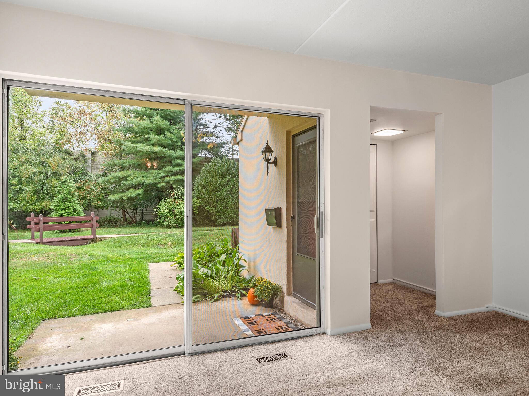 93 Old Forge Crossing, Unit 93 Devon, PA 19333 - Photo 4 of 34 Oversized Sliding glass doors to Patio