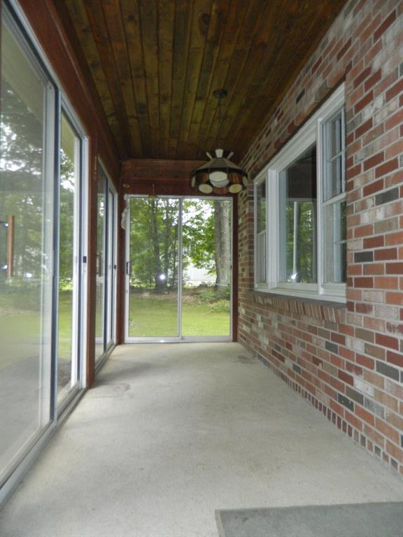 144 Country Club 3 Road Sanford, ME 04073 - Photo 30 of 35 Glassed-in front porch. Ideal for...