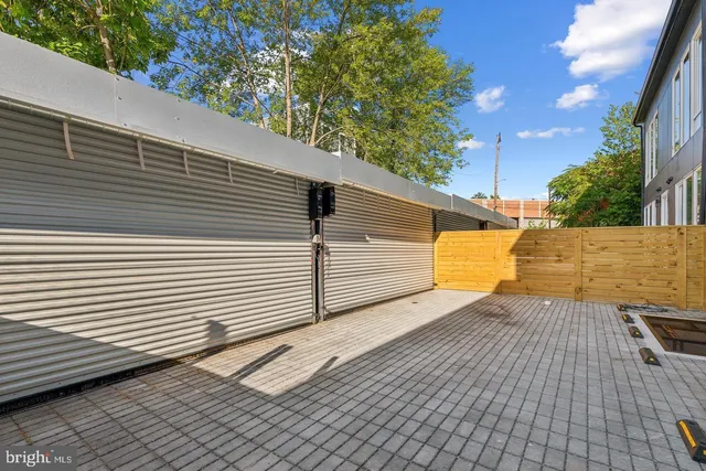 a view of a backyard of the house