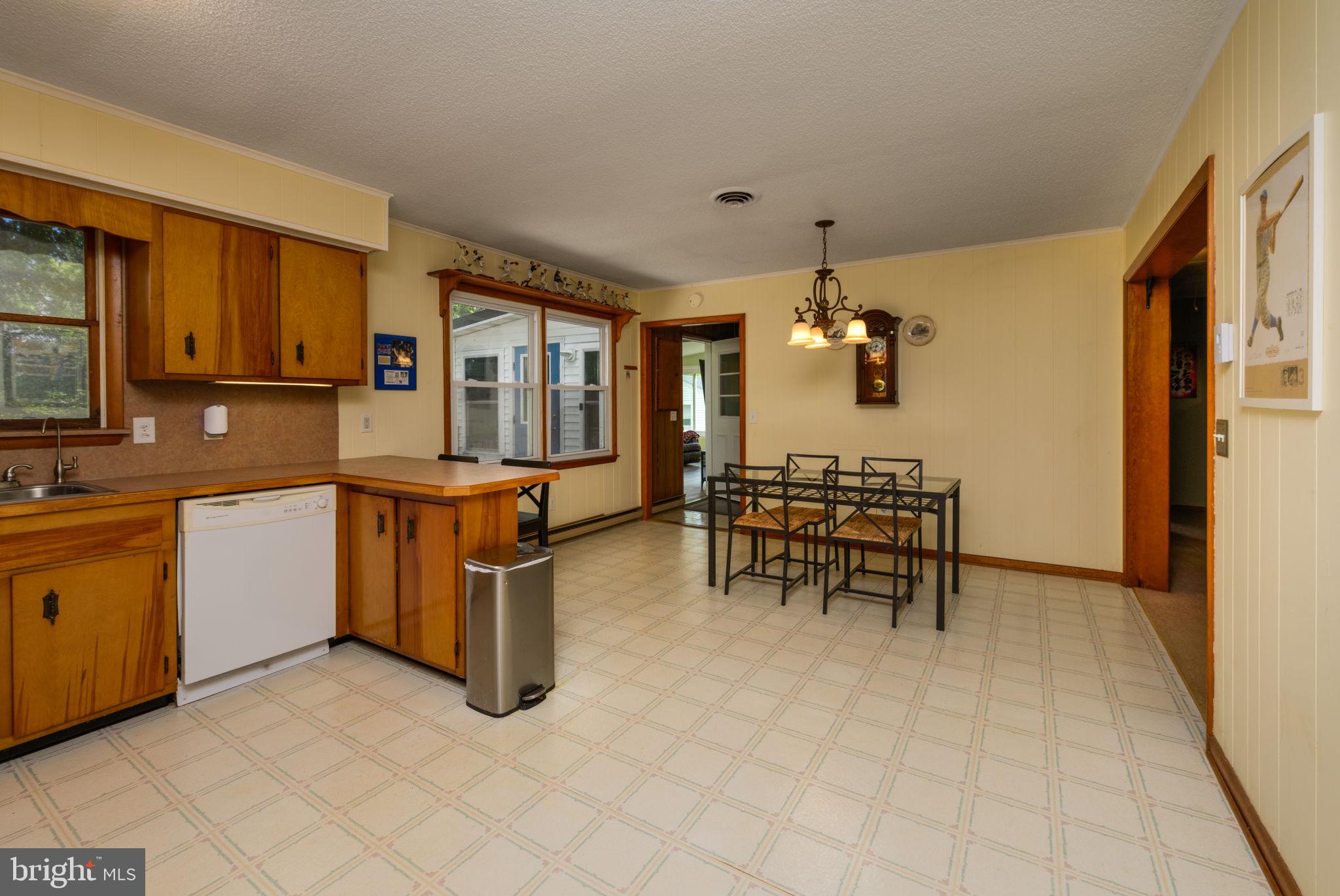 32517 Molly Field Road Dagsboro, DE 19939 - Photo 16 of 25 Spacious kitchen with inviting charm.