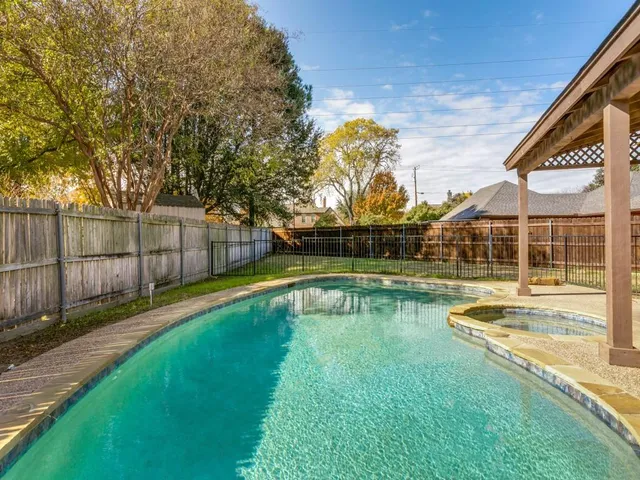 a view of a house with swimming pool