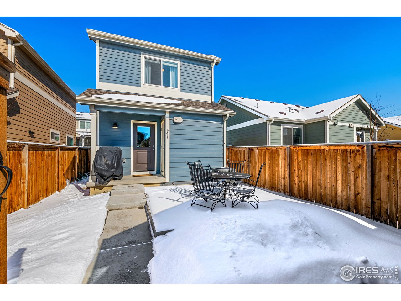 713 Country Rd Trail Berthoud, CO 80513 - Photo 24 of 27 Back door and back yard