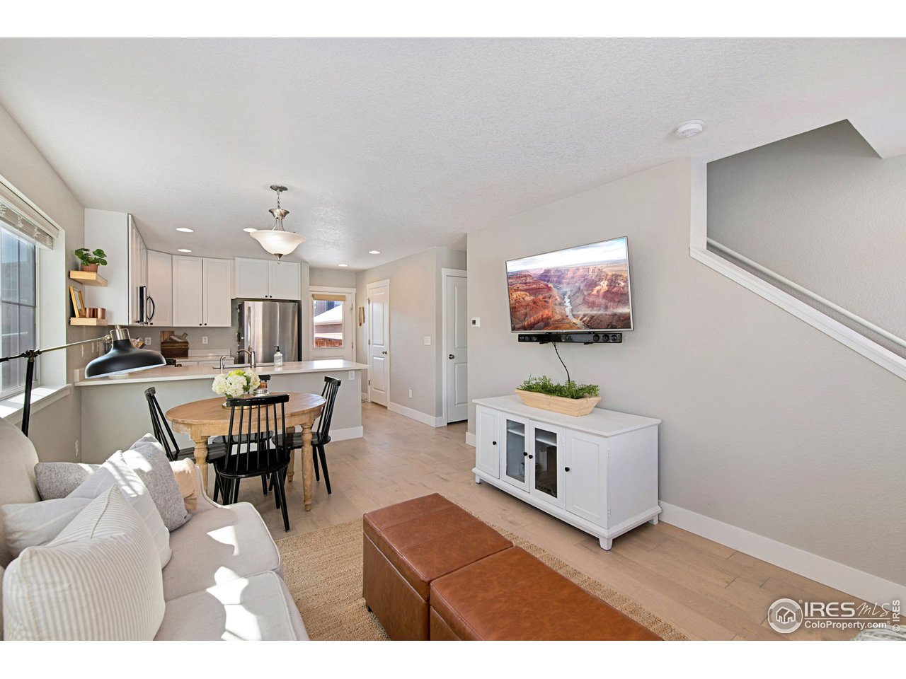 713 Country Rd Trail Berthoud, CO 80513 - Photo 7 of 27 Open living space and kitchen