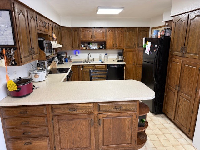 18 Sawmill Road Carbondale, IL 62902 - Photo 10 of 26 a kitchen with a refrigerator a sink a stove and cabinets