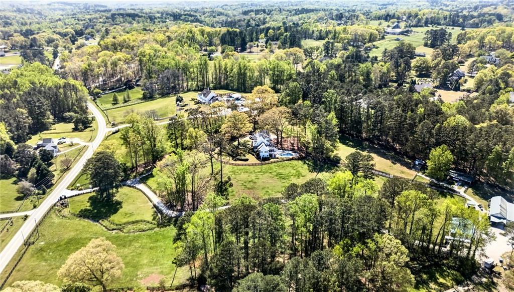 565 Old Lathemtown Road Canton, GA 30115 - Photo 3 of 73 an aerial view of residential houses with outdoor space